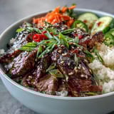 Tender sesame-ginger Korean Beef Power Bowl, perfect for a flavorful weeknight meal.