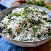 Vibrant Spring Pea and Mint Rice Pilaf with Fresh Herbs and Lemon Zest