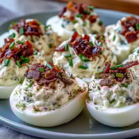 Creamy bacon ranch deviled eggs with crispy bacon crumbles, perfect for Easter brunch or parties.